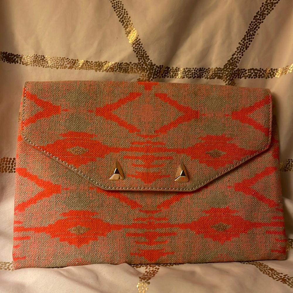 Stella & Dot Tan/orange Aztec design City Slim Woven Clutch like new